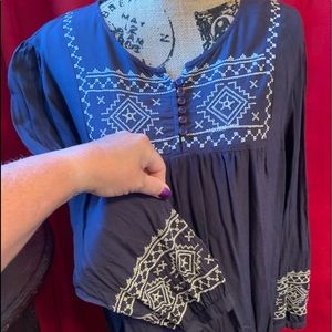 Tunic with unique stitch work